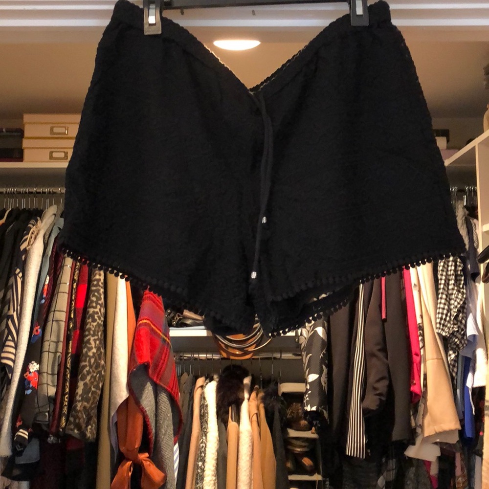 Black Vince Camuto shorts.